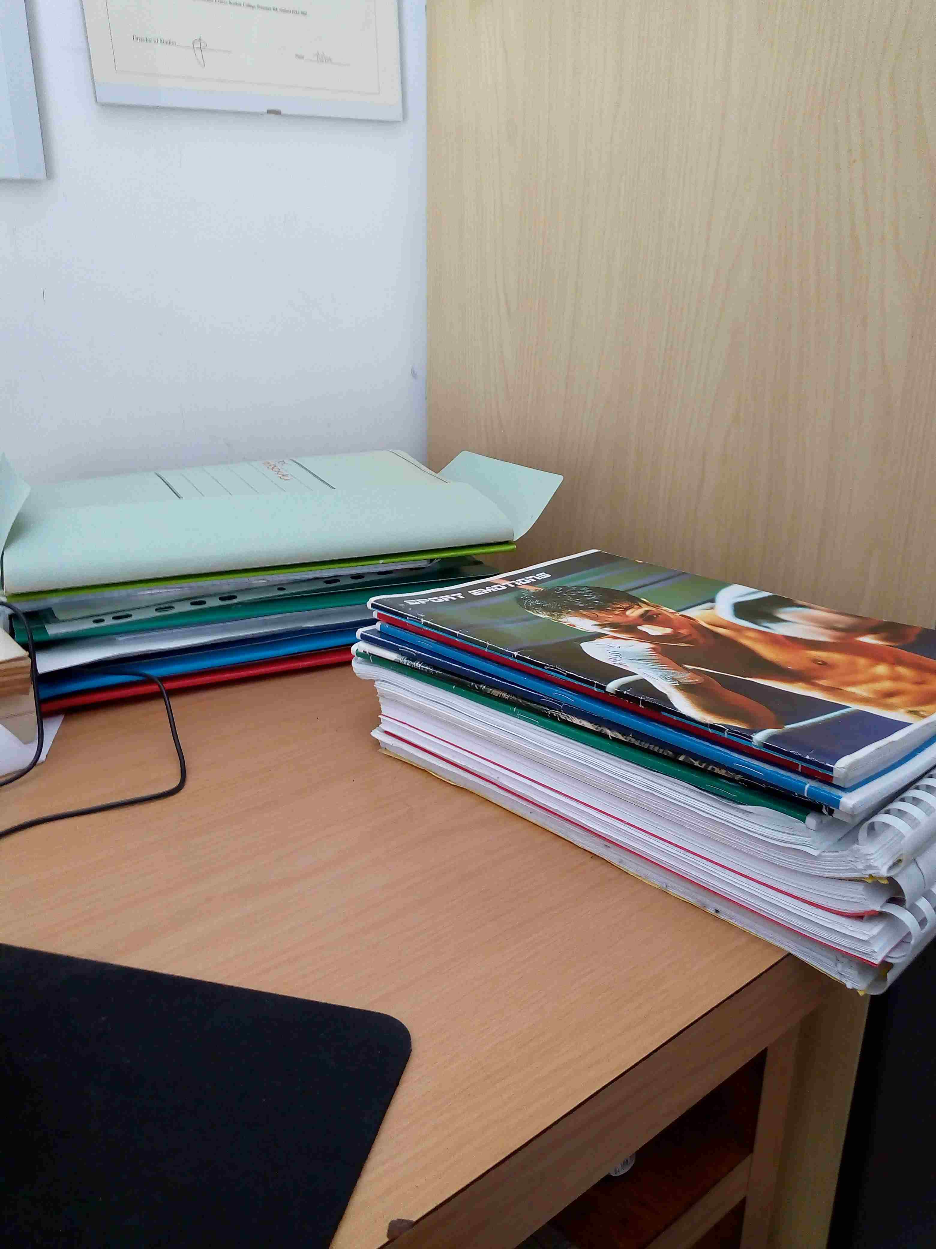 Some copybooks and folders filled with maths.