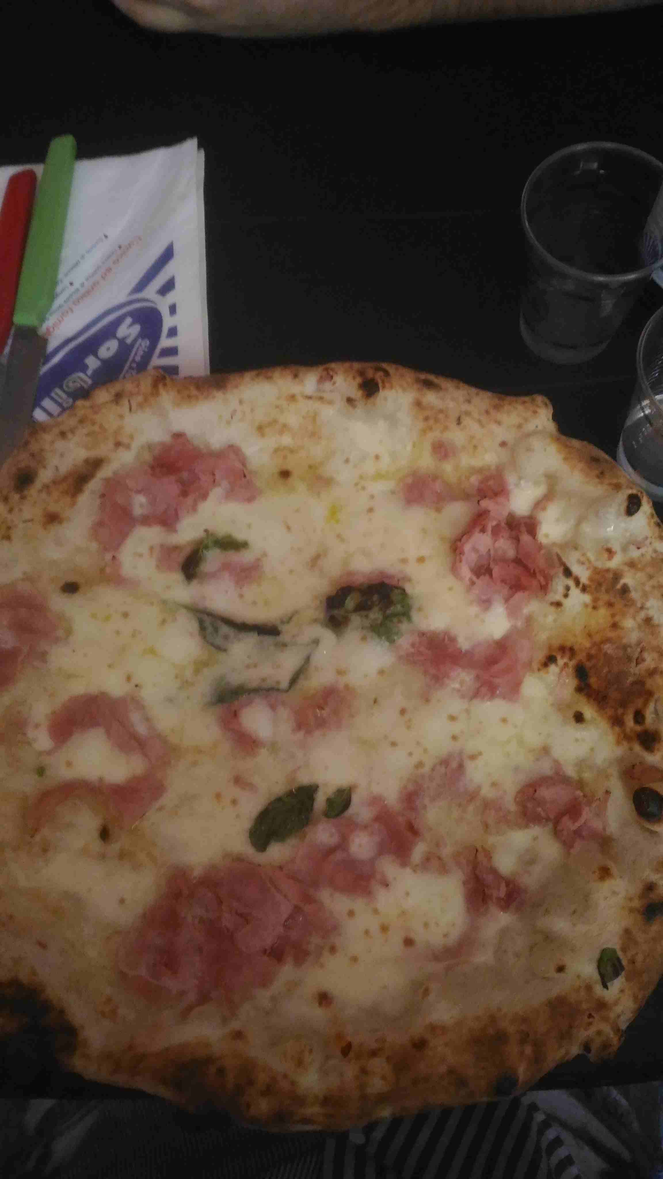 Incredibly tasteful white pizza with ham and buffalo mozzarella.